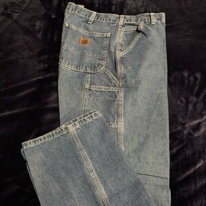Classic Carhartt Blue Denim Jean. Full cut. 34 waist 32 length.